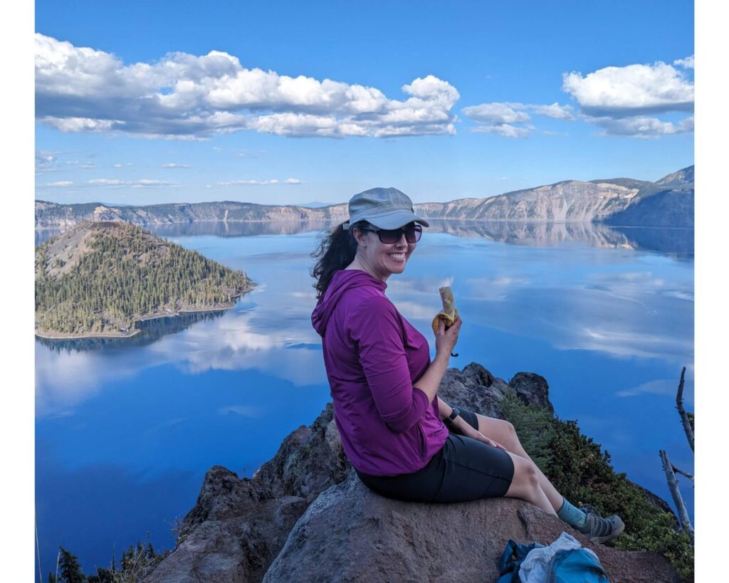 Eating a banana at Crater Lake - day pack hiking list