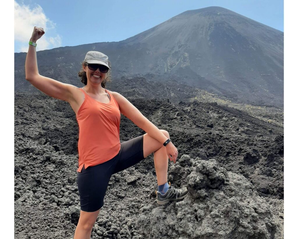Orange tank top at a volcano in Guatemala