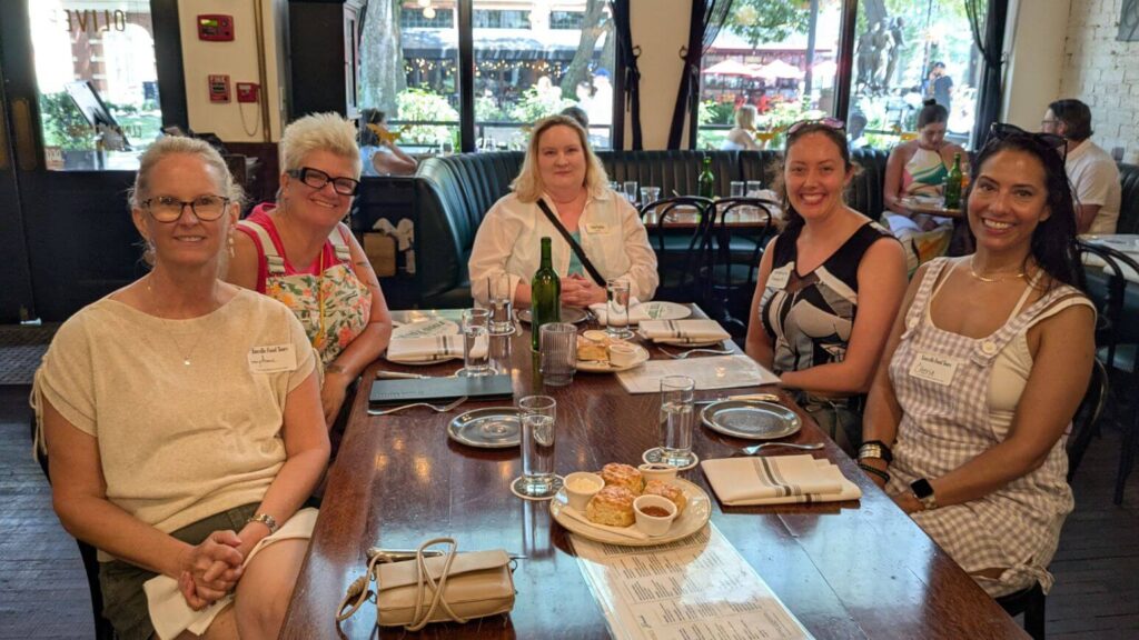 Food tour group seated at a restaurant on a Knoxville Food Tour